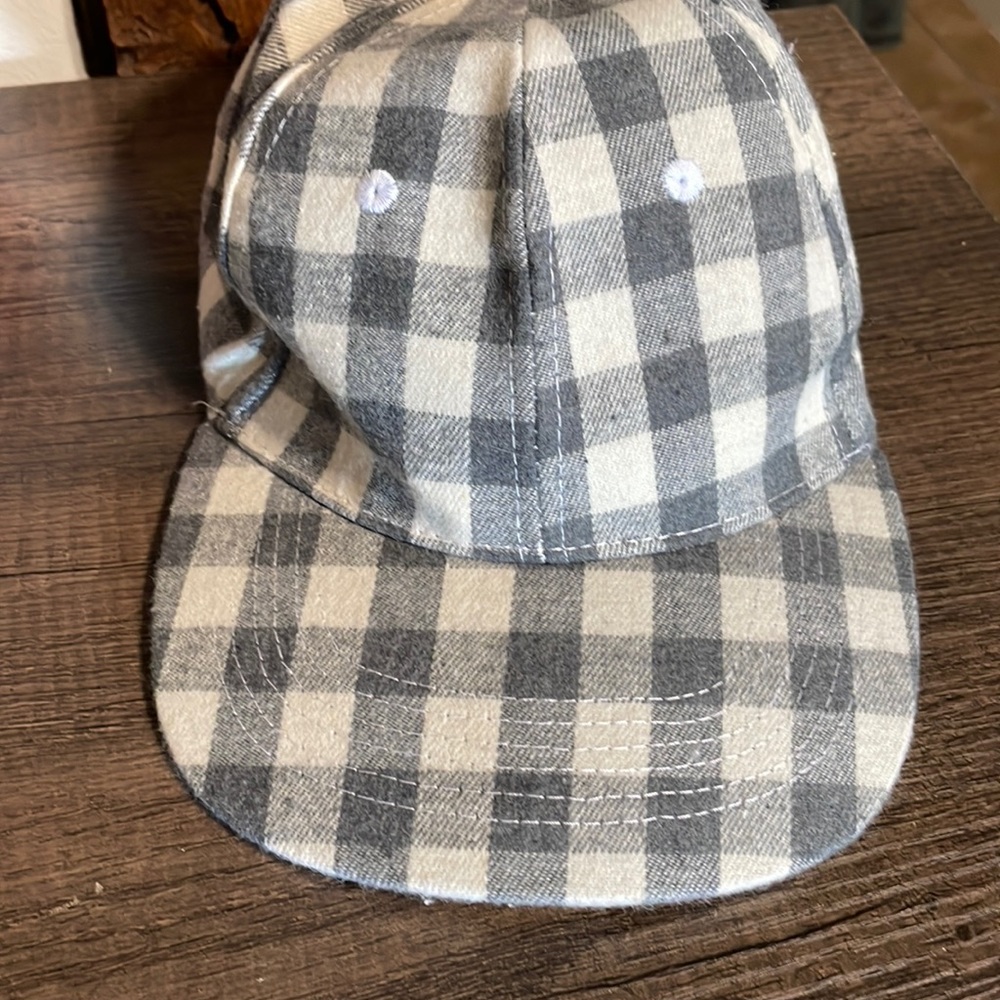 Grey and white hat